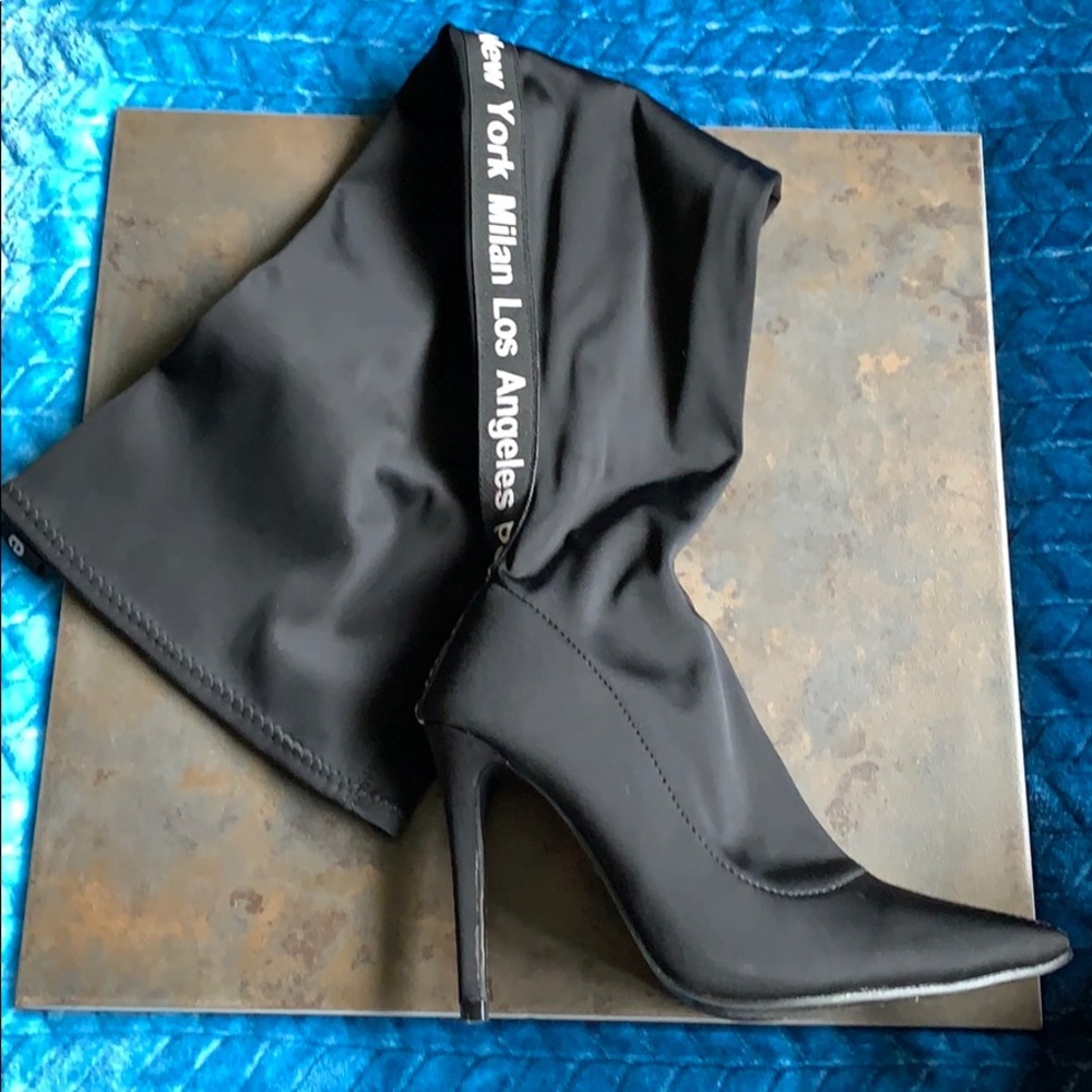 Black thigh high boots